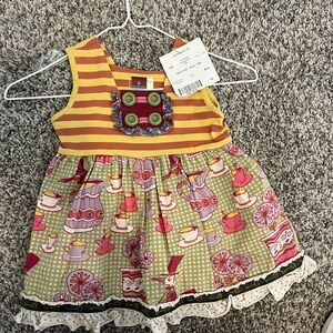 Matilda Jane teacup tunic.
so cute!